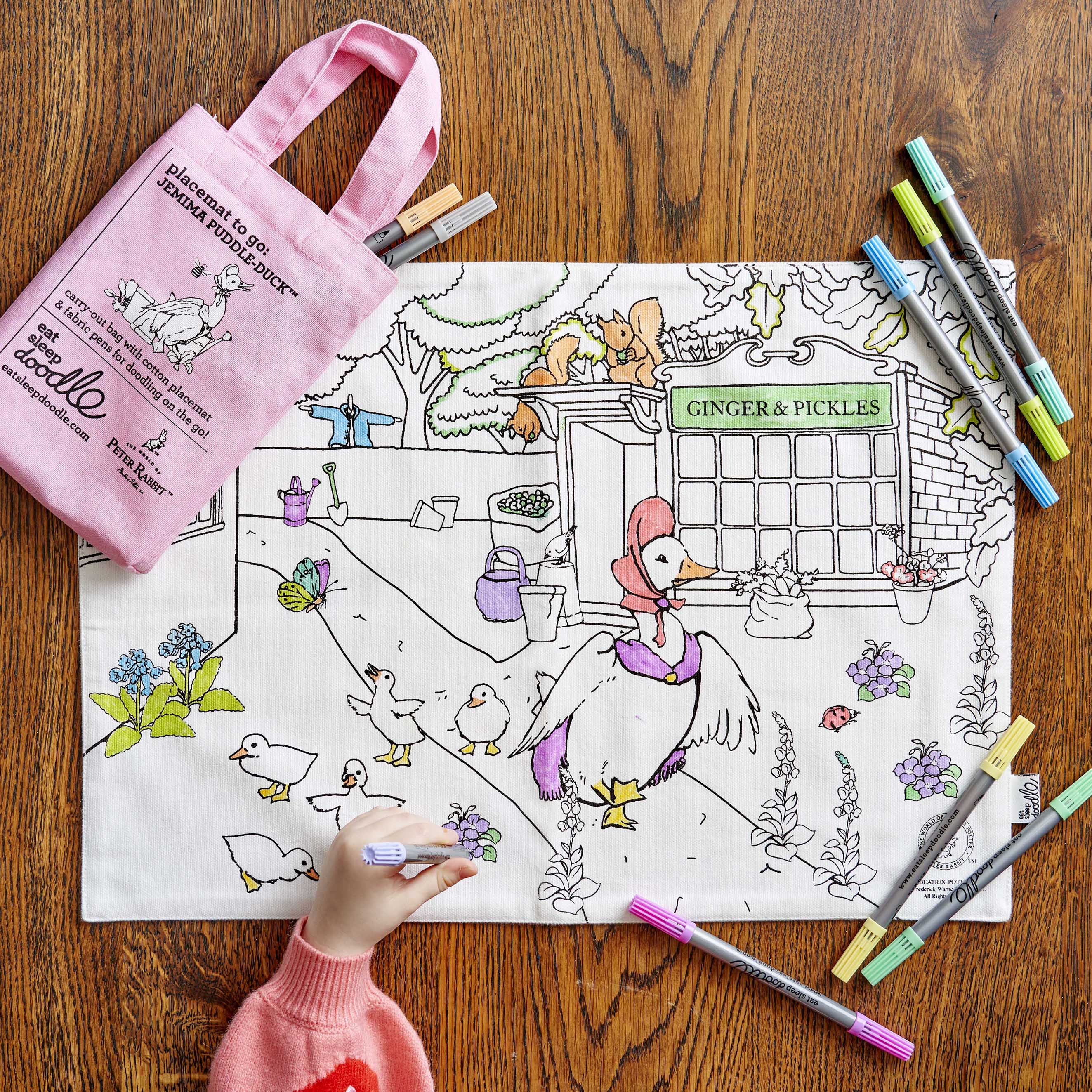 peter rabbit placemat with pink carry bag