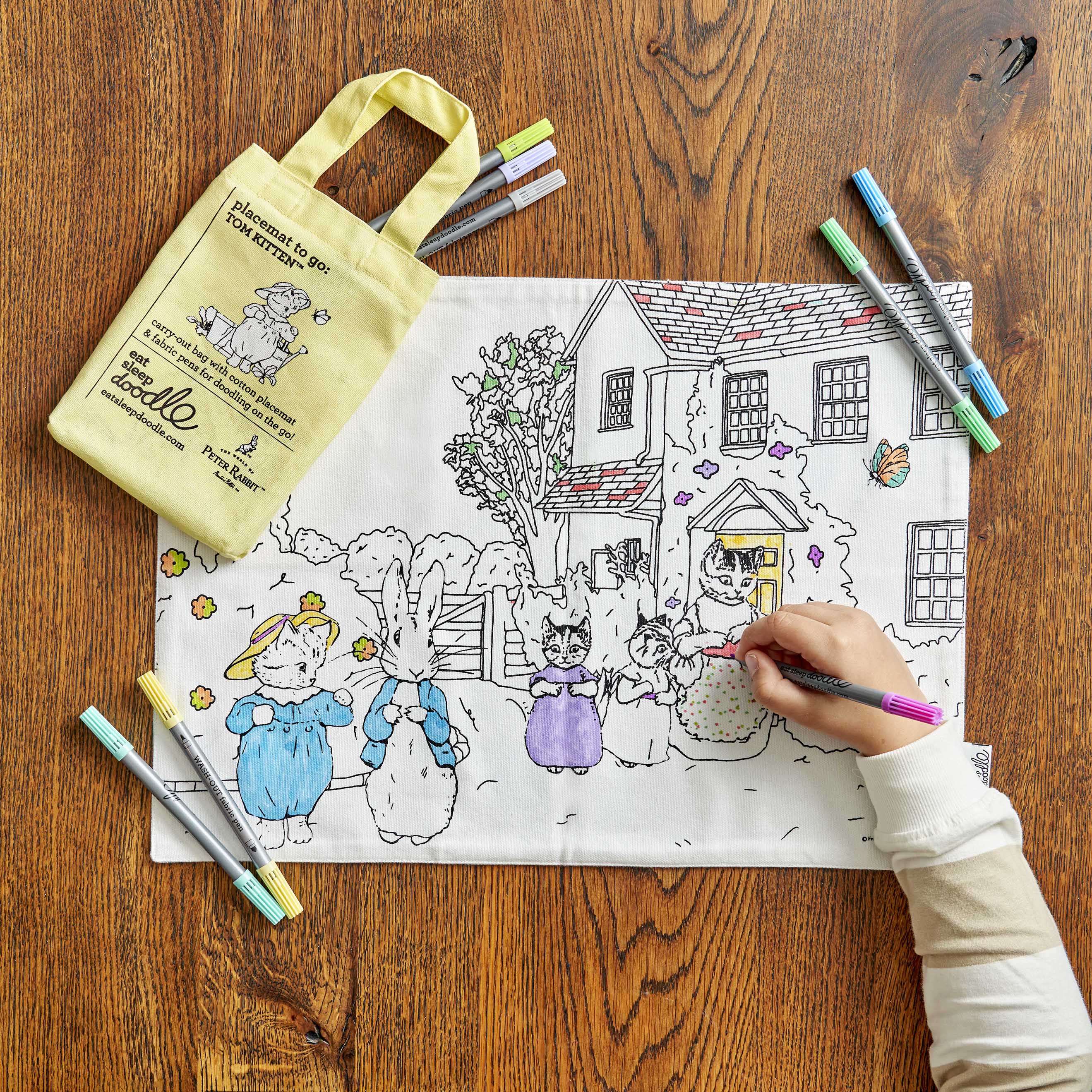 peter rabbit placemat with yellow carry bag