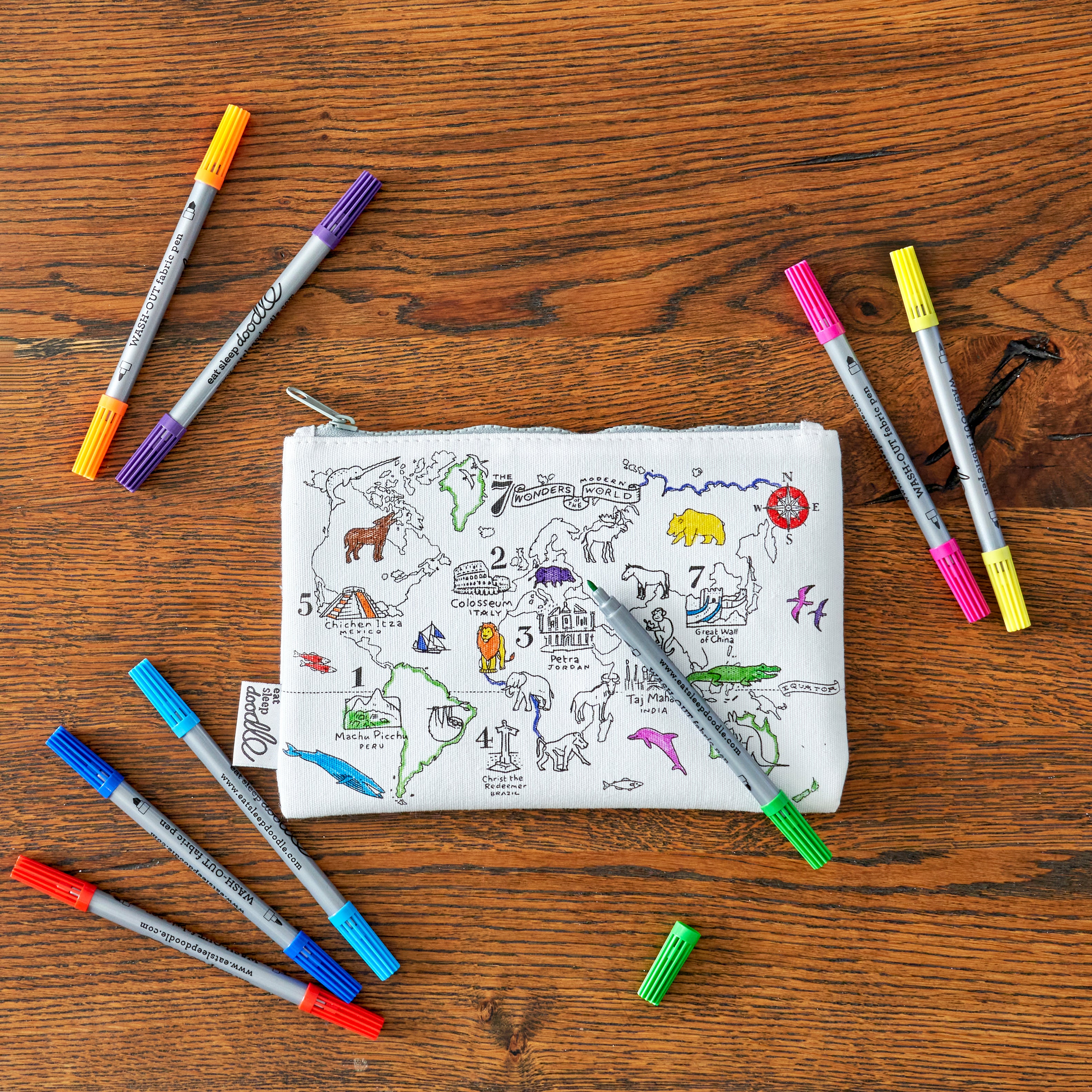 world map pencil case on a wooden table