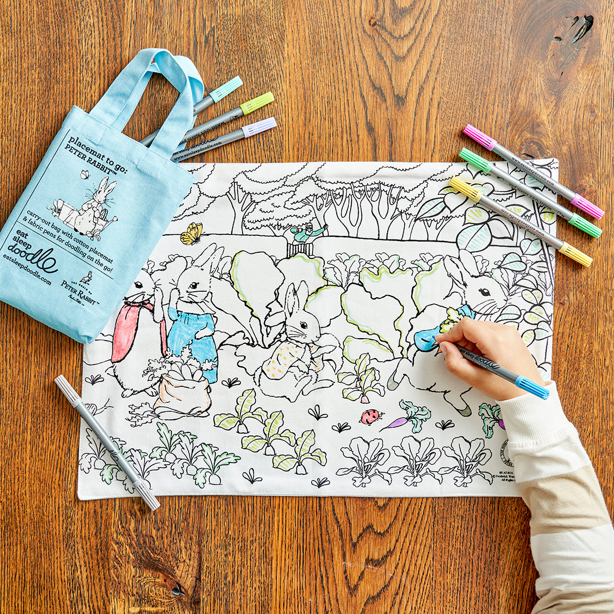 peter rabbit placemat with blue carry bag